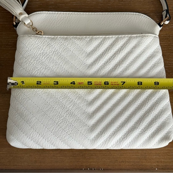 White Chevron Quilted Medium Crossbody Bag with Tassel Accent - Picture 9 of 11